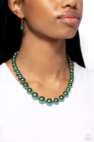 A single strand of emerald green pearls elegantly cascades below the collar, creating a glamorous graceful effect. Features an adjustable clasp closure.  Sold as one individual necklace. Includes one pair of matching earrings.