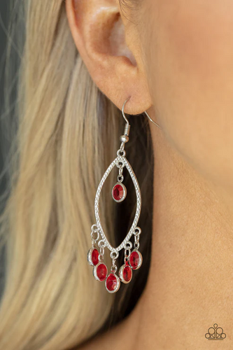 Glassy red gems dangle from the top and bottom of a textured silver marquise frame, creating a glamorous fringe. Earring attaches to a standard fishhook fitting.  Sold as one pair of earrings.