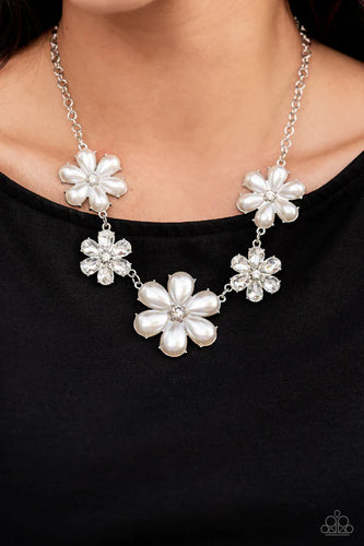 Featuring glassy white rhinestone centers, bubbly pearl-petaled flowers gradually increase in size as they alternate with white rhinestone-petaled flowers below the collar for a fierce floral fashion. Features an adjustable clasp closure.  Sold as one individual necklace. Includes one pair of matching earrings.