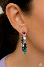 Load image into Gallery viewer, Featuring a scalloped heart frame, glittery heart rhinestones in shades of pink, iridescence, purple, blue, and a refracted green shimmer slowly decrease in size as they curve down the ear to meet dainty silver hearts for a romantic statement. Earring attaches to a standard post fitting. Hoop measures approximately 1 3/4&quot; in diameter. Due to its prismatic palette, color may vary.  Sold as one pair of hoop earrings.
