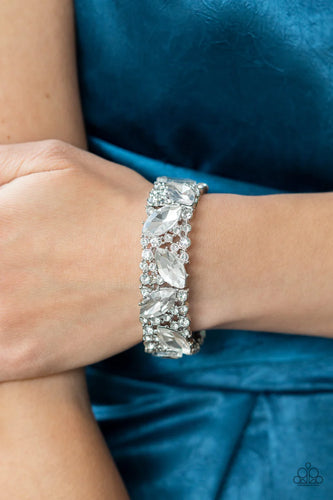 Oversized marquise-cut white rhinestones sparkle atop icy frames of dainty silver studs and white rhinestones that are threaded along stretchy bands around the wrist for a jaw-dropping dazzle.  Sold as one individual bracelet.