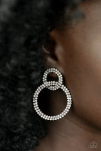 Load image into Gallery viewer, Rows of sparkly white rhinestones encircle two interconnected hoops, creating a jaw-dropping lure. Earring attaches to a standard post-fitting.  Sold as one pair of post earrings.
