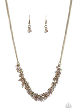 Load image into Gallery viewer, Dainty brassy tone-on-tone iridescent beads swing from doubled brass chains, creating a clustered fringe below the collar. Features an adjustable clasp closure.  Sold as one individual necklace. Includes one pair of matching earrings.
