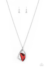 Load image into Gallery viewer, A triangular red gem is nestled inside folds of a shiny silver frame and white rhinestone encrusted silver ribbons, creating an asymmetrical pendant at the bottom of a lengthened silver chain. Features an adjustable clasp closure.  Sold as one individual necklace. Includes one pair of matching earrings.
