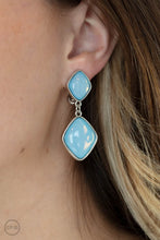 Load image into Gallery viewer, A pair of diamond shaped Cerulean opals are pressed into the centers of rustic silver frames that link into an ethereal lure. Earring attaches to a standard clip-on fitting.  Sold as one pair of clip-on earrings.
