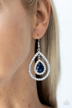 Load image into Gallery viewer, A brilliant blue teardrop gem, encased in a sparkling white rhinestone frame, creates a striking pendant as it dangles inside an airy teardrop frame encrusted with white rhinestones and culminates into a mesmerizing lure. Earring attaches to a standard fishhook fitting.  Sold as one pair of earrings.
