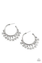 Load image into Gallery viewer, A shiny collection of silver star charms trickles from the bottom of a classic silver hoop, creating a stellar fringe. Earring attaches to a standard post fitting. Hoop measures approximately 1 1/4&quot; in diameter.  Sold as one pair of hoop earrings.
