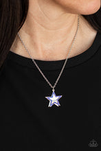 Load image into Gallery viewer, A blue rhinestone encrusted silver star delicately overlaps with a shiny silver star below the collar, creating a sparkly patriotic pendant. Features an adjustable clasp closure.  Sold as one individual necklace. Includes one pair of matching earrings.
