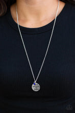 Load image into Gallery viewer, Infused with a solitaire blue rhinestone, a shiny silver disc is stamped in the patriotic phrase, &quot;Star Spangled and Sassy,&quot; as is glides along a lengthened silver chain for a sassy finish. Features an adjustable clasp closure.  Sold as one individual necklace. Includes one pair of matching earrings.
