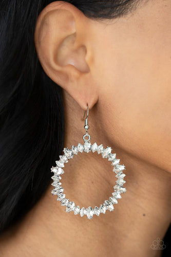 Encased in pronged silver fittings, a sparkly collection of marquise cut rhinestones delicately coalesce into a brilliant white hoop for a show-stopping finish. Earring attaches to a standard fishhook fitting.  Sold as one pair of earrings.