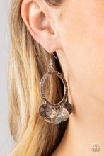 Load image into Gallery viewer, Haphazardly etched in gritty linear textures, an antiqued silver hoop gives way to a fringe of star stamped copper, gold, and silver discs. Earring attaches to a standard fishhook fitting.  Sold as one pair of earrings.
