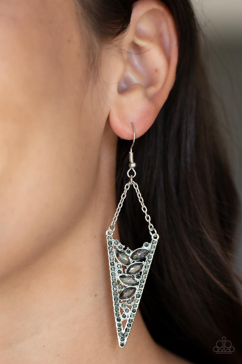 Suspended by silver chains, the center of a smoky rhinestone encrusted silver frame is filled with round and marquise smoky rhinestones for a flashy finish. Earring attaches to a standard fishhook fitting.  Sold as one pair of earrings.