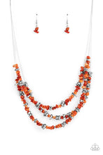 Load image into Gallery viewer, An earthy collection of raw cut silver and orange pebbles are threaded along dainty wires below the collar, creating refreshing layers. Features an adjustable clasp closure.  Sold as one individual necklace. Includes one pair of matching earrings.
