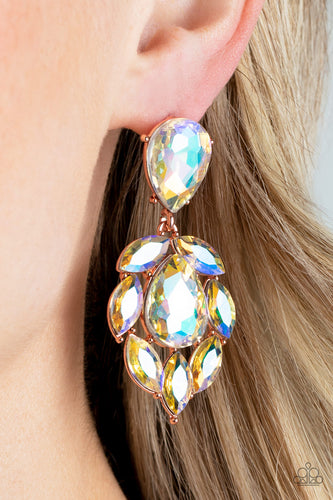 A stellar collection of marquise cut iridescent rhinestones nestle around an oversized teardrop iridescent rhinestone, creating a dramatically stellar display at the bottom of a matching iridescent teardrop rhinestone. Earring attaches to a standard post fitting.  Sold as one pair of post earrings.