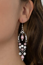 Load image into Gallery viewer, Glittery white rhinestones and pearly pink beaded fittings delicately swing from the bottom of an ornately embellished oval frame. A matching pearly frame dangles from the top of the decorative silver frame, adding timeless movement to the sparkly display. Earring attaches to a standard fishhook fitting.  Sold as one pair of earrings.
