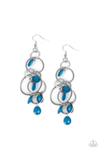 Load image into Gallery viewer, Opaque Mykonos Blue teardrops sporadically cascade from an assortment of mismatched silver links, resulting in a whimsically tasseled chandelier. Earring attaches to a standard fishhook fitting.
