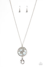 Load image into Gallery viewer, A bubbly collection of white rhinestones and round and marquise opalescent gems coalesce inside of a silver frame, creating an effervescent pendant at the bottom of a silver chain. A lobster clasp hangs from the bottom of the design to allow a name badge or other item to be attached. Features an adjustable clasp closure.  Sold as one individual lanyard. Includes one pair of matching earrings.
