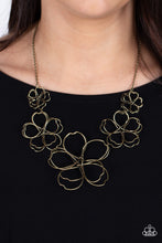 Load image into Gallery viewer, Rustic brass wire delicately twists into oversized blossoms. Gradually increasing in size, the 3D frames elegantly pop beneath the collar. Features an adjustable clasp closure.  Sold as one individual necklace. Includes one pair of matching earrings.
