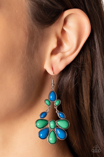 Encased in textured silver fittings, a mismatched collection of oval, marquise, and teardrop Mykonos Blue and Leprechaun beads connect and link into a vivacious lure. Earring attaches to a standard fishhook fitting.  Sold as one pair of earrings.