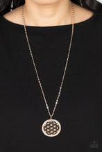 Load image into Gallery viewer, Glittery white rhinestones create a brilliant round frame brimming with airy floral petals, coalescing into a charming medallion that sways from the bottom of a lengthened rose gold chain. Features an adjustable clasp closure.  Sold as one individual necklace. Includes one pair of matching earrings.
