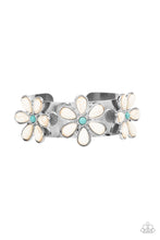 Load image into Gallery viewer, Dotted with turquoise stone centers, a trio of white stone petaled flowers bloom atop a thick silver cuff for a whimsical pop of floral fashion.  Sold as one individual bracelet.
