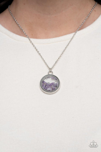 Infused with a sleek silver fitting, an earthy collection of dainty amethyst stones are encased in a glassy frame at the bottom of a dainty silver chain. Features an adjustable clasp closure.  Sold as one individual necklace. Includes one pair of matching earrings.