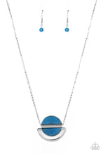 Load image into Gallery viewer, A pair of blue acrylic half moon frames are separated by a shiny silver bar at the bottom of a crescent shaped silver frame, resulting in an ethereal pendant at the bottom of an extended silver chain. Due to the nature of the materials, colors may vary. Features an adjustable clasp closure.  Sold as one individual necklace. Includes one pair of matching earrings.
