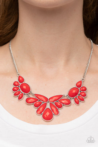 A dewy collection of oval, teardrop, and marquise red beads fans out below the collar, blooming into enchanting floral frames that delicately link into a whimsical centerpiece.  Sold as one individual necklace. Includes one pair of matching earrings.
