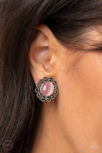 Load image into Gallery viewer, Folds of textured silver petals gather around an oval Pale Rosette cat&#39;s eye stone, blooming into an ethereal floral centerpiece. Earring attaches to a standard clip-on fitting.  Sold as one pair of clip-on earrings.
