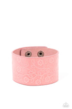 Load image into Gallery viewer, A flowery and leafy motif blooms across the front of a distressed pink leather band, resulting in a rustic floral centerpiece around the wrist. Features an adjustable snap closure.  Sold as one individual bracelet.
