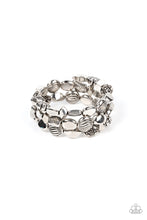 Load image into Gallery viewer, An enchanting assortment of shiny silver, faceted, and floral embossed beads alternates along a coiled wire, creating a whimsical infinity style bracelet around the wrist.  Sold as one individual bracelet.
