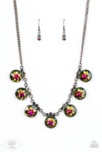 Load image into Gallery viewer, Crowned in a trio of dainty hematite rhinestones, an exaggerated display of oversized oil spill gems delicately link below the collar for a glamorous glow. Features an adjustable clasp closure.  Sold as one individual necklace. Includes one pair of matching earrings.
