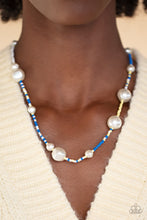 Load image into Gallery viewer, Irregular-shaped pearls in varying sizes are scattered amongst blue, yellow, and white seed beads that are threaded along a wire, resulting in a refreshing and playful style below the collar.  Sold as one individual necklace. Includes one pair of matching earrings.
