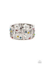 Load image into Gallery viewer, Sporadically dotted with multicolored and iridescent rhinestones, an airy daisy pattern blooms inside trapezoidal silver frames that are threaded along stretchy bands around the wrist for a seasonal statement. Due to its prismatic palette, color may vary.  Sold as one individual bracelet.
