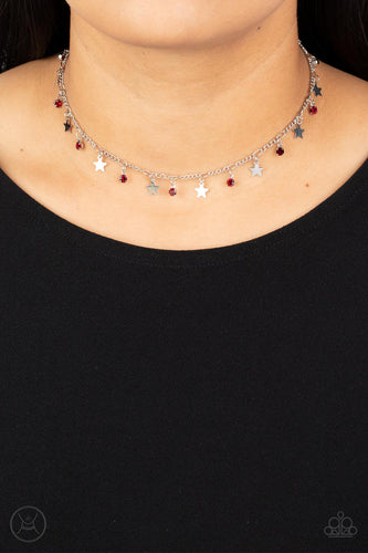 Dainty red rhinestones and flat silver stars twinkle along a classic silver chain around the neck, resulting in a stellar fringe. Features an adjustable clasp closure.  Sold as one individual choker necklace. Includes one pair of matching earrings.