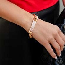 Load image into Gallery viewer, Encrusted in blinding rows of glassy white rhinestones, a sparkly rectangular centerpiece links with chunky gold curb chain around the wrist for a gritty-glamorous fashion. Features an adjustable clasp closure. Sold as one individual bracelet.
