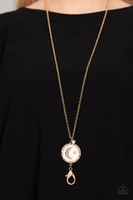 Load image into Gallery viewer, Painted in a milky pearlized lacquer finish, an asymmetrical gold disc is dotted with a dainty gold moon and star accent as it swings from the bottom of a lengthened gold chain. Sold as one individual lanyard. Includes one pair of matching earrings.
