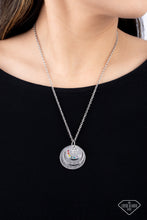 Load image into Gallery viewer, Dotted in a rainbow of dainty rhinestones, a shiny silver disc sits atop two overlapping silver discs that gradually increase in size. Sold as one individual necklace. Includes one pair of matching earrings.

