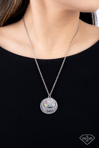 Dotted in a rainbow of dainty rhinestones, a shiny silver disc sits atop two overlapping silver discs that gradually increase in size. Sold as one individual necklace. Includes one pair of matching earrings.