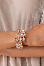 Load image into Gallery viewer, Rose gold and peachy iridescent marquise-cut gems blossom from an array of rose gold marquise frames embossed in leafy filigree and tactile studs. Each frame interlocks around the wrist in a whimsical pattern to create a laurel-inspired design. Features a hinged closure. Due to its prismatic palette, color may vary.  Sold as one individual bracelet.
