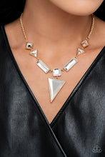 Load image into Gallery viewer, An array of glassy white gems are chiseled into geometric shapes and pressed into shimmery gold frames. The angular display falls to a dramatic point at the center, where a square-cut gem anchors an upside-down triangular pendant for a flawless finish. Features an adjustable clasp closure.  Sold as one individual necklace. Includes one pair of matching earrings.
