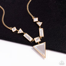 Load image into Gallery viewer, An array of glassy white gems are chiseled into geometric shapes and pressed into shimmery gold frames. The angular display falls to a dramatic point at the center, where a square-cut gem anchors an upside-down triangular pendant for a flawless finish. Features an adjustable clasp closure.  Sold as one individual necklace. Includes one pair of matching earrings.
