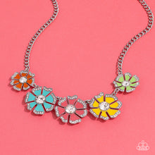 Load image into Gallery viewer, Dotted with dainty white rhinestone petal edges and white gem centers, a vibrant assortment of Burnt Coral, Samoan Sun, Orange Tiger, apple green, and tiffany blue flowers link below the collar for a playful pop of color. Features an adjustable clasp closure.  Sold as one individual necklace. Includes one pair of matching earrings.
