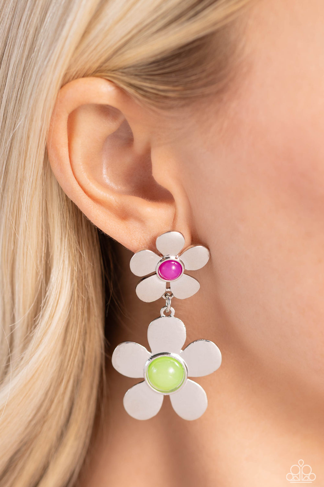 Sleek silver flowers featuring glassy orchid and pale green beaded centers gradually increase in size as they fall from the ear, infusing the sophisticated design with whimsical movement. Earring attaches to a standard post fitting.  Sold as one pair of post earrings.